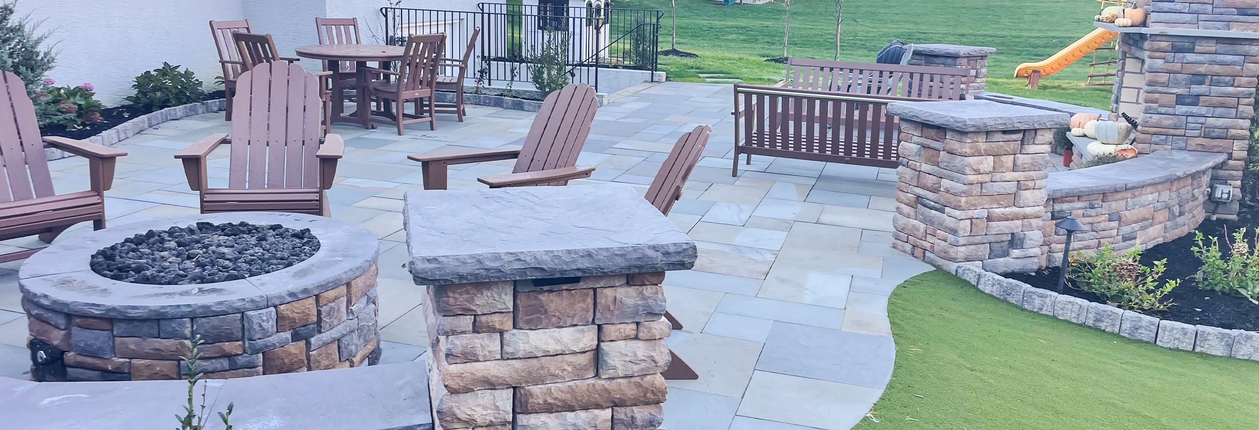 patio with firepit from CKC Landscaping