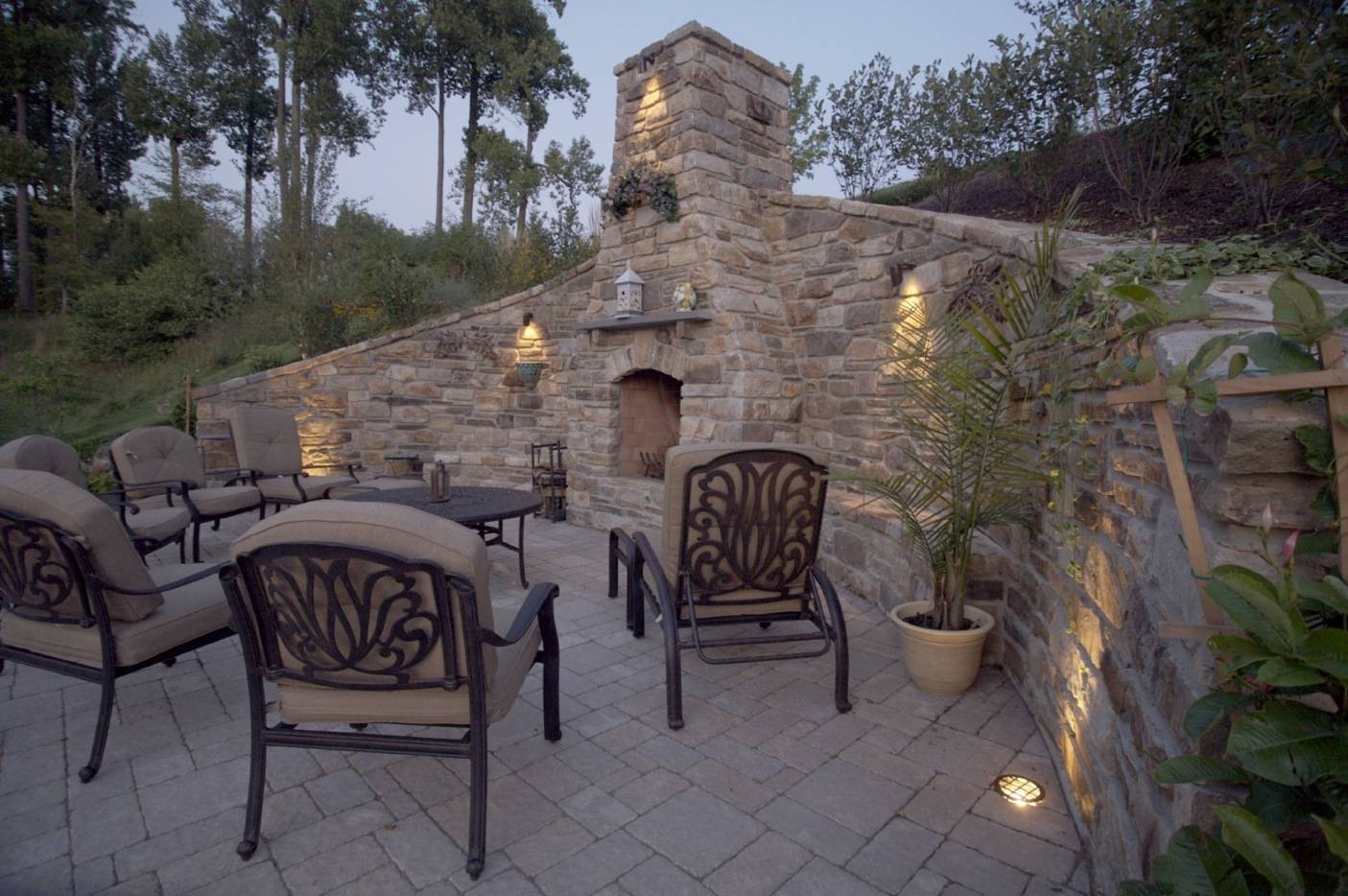 Backyard patio with fireplace from CKC Landscaping