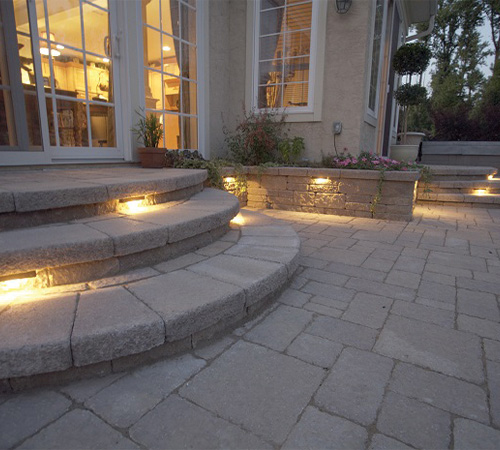 patio with stairs leading to house from CKC Landscaping