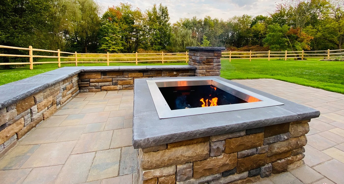 fireplace on a patio from CKC landscaping