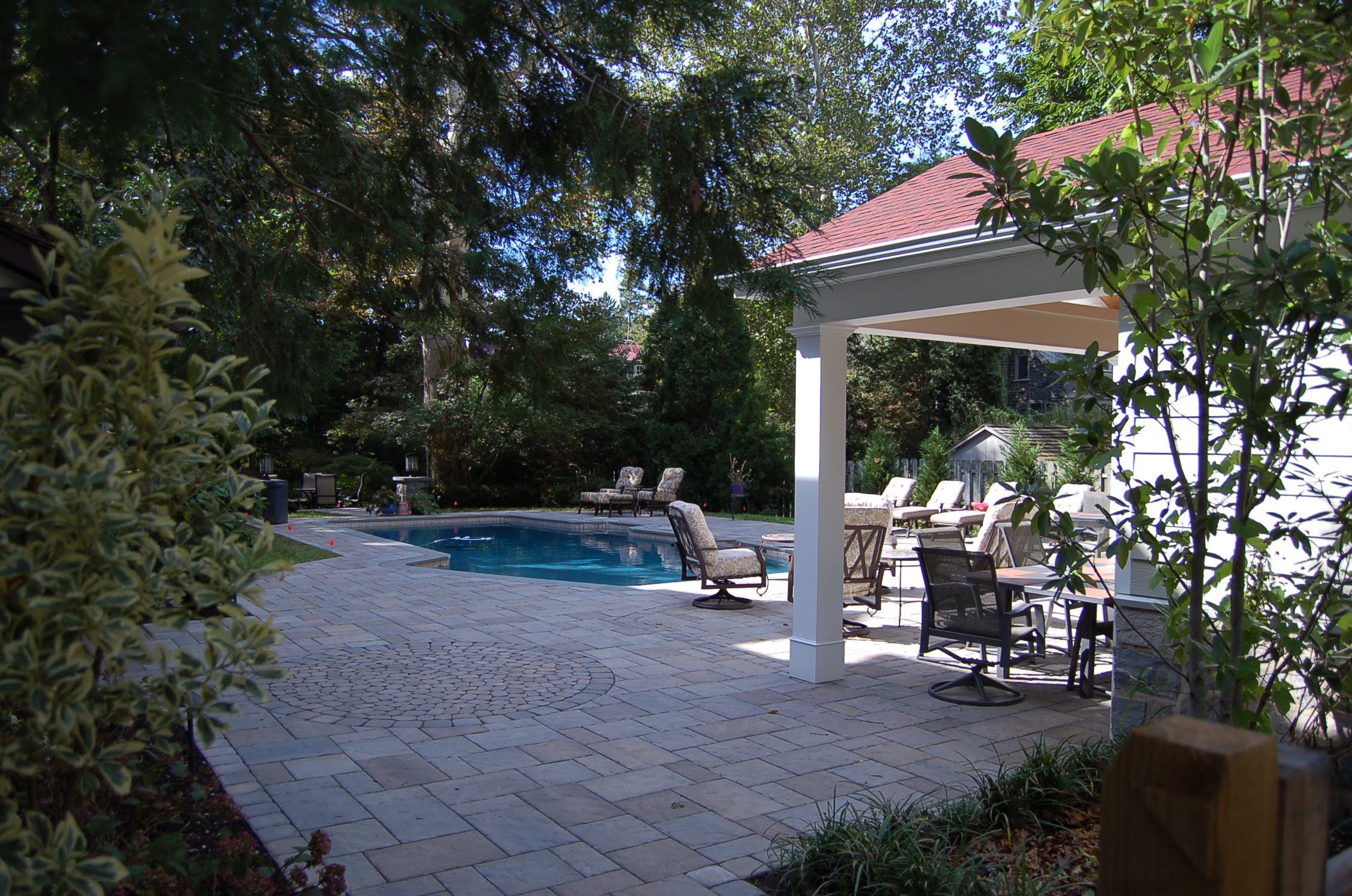 Pool paver patio and cabano designed and installed by CKC Landscaping
