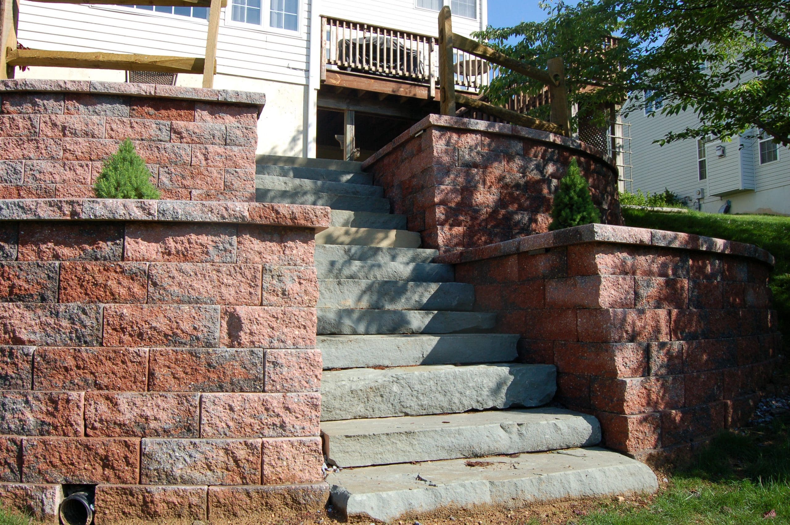 Staircase leading up to a patio from CKC landscaping