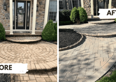 Repaired paver front entrance with circle patterns and fixed loose bullnose steps in West Chester