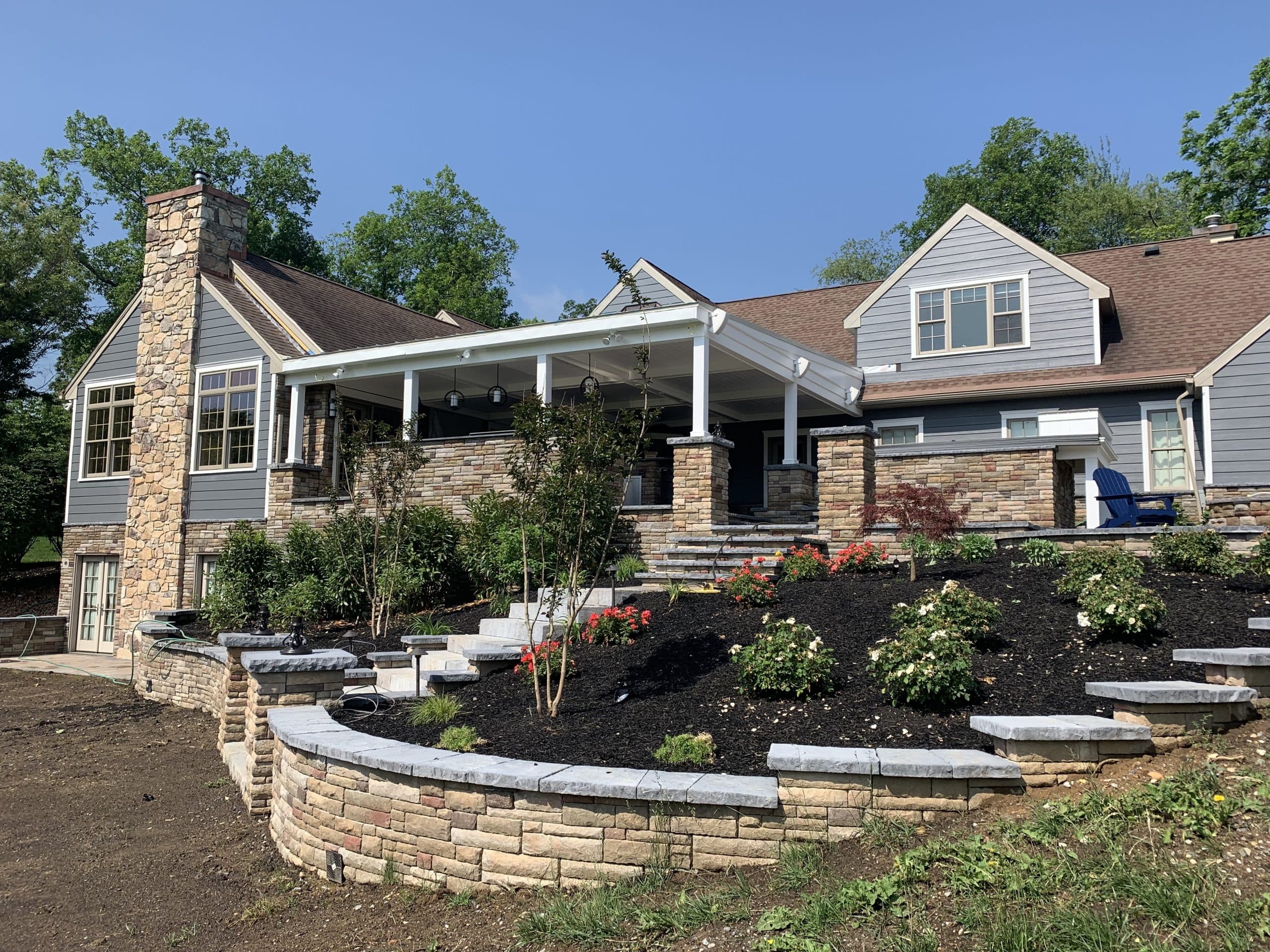 retaining wall with stairs going up from CKC landscaping