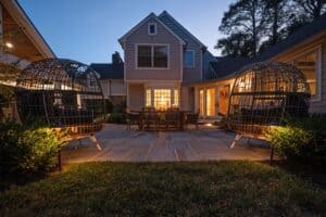 Estate home in Chadds Ford illuminated by architectural up-lighting and path lights