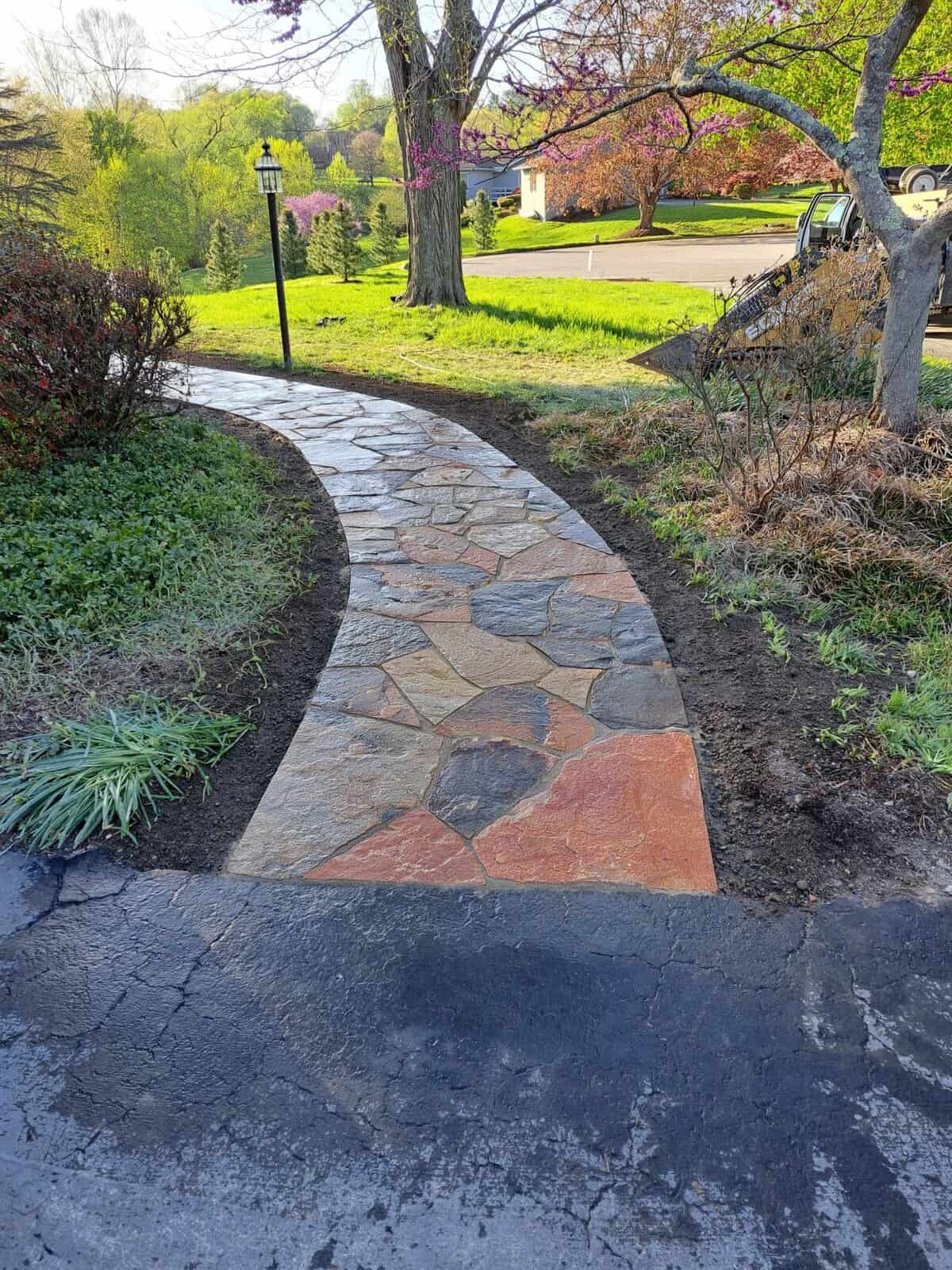 Estate-Entrance-Landscaping-Design Stone entrance pillars and landscape lighting for Chester Springs driveway
