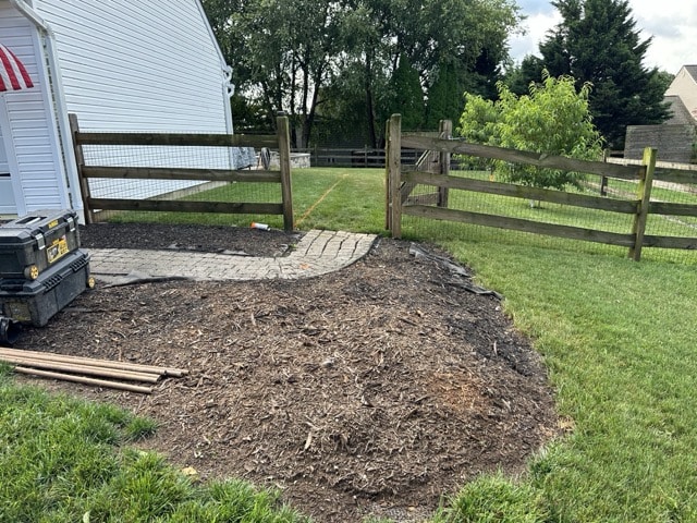 Thermal flagstone walkway with custom artificial turf putting green in Kennett Square PA.