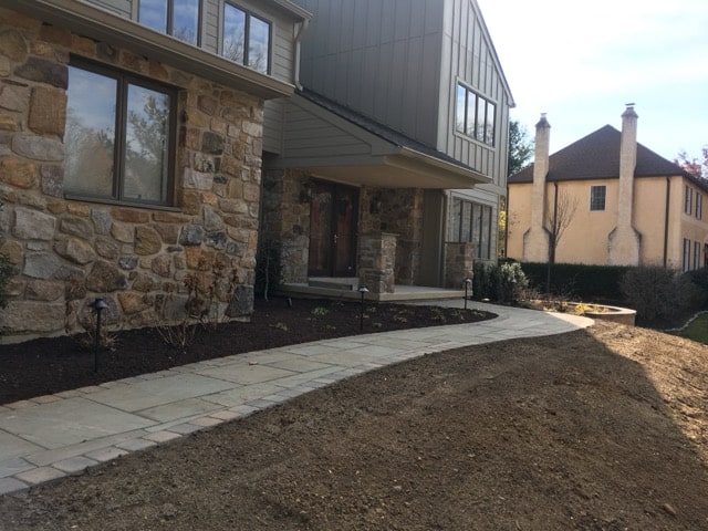 Full color thermal flagstone walkway with 6x6 paver sailor course border in West Chester PA.