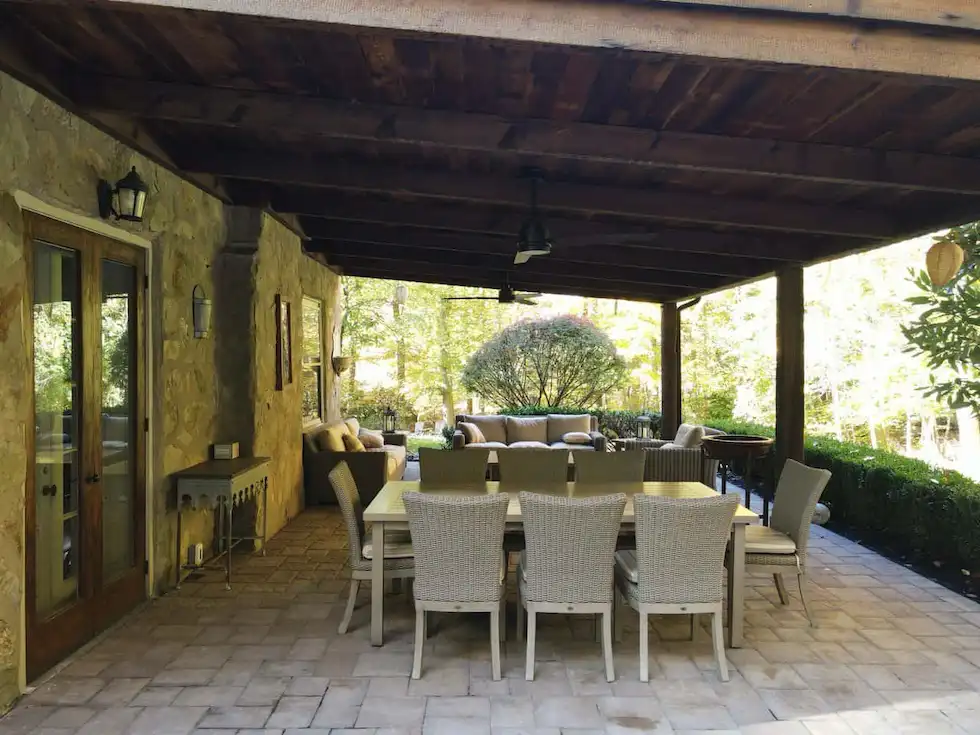 Barnwood-Roof-Paver-Patio-Hardscape-Chadds-Ford Barnwood Roof and paver patio installation complementing a historic stone farmhouse in Chadds Ford PA