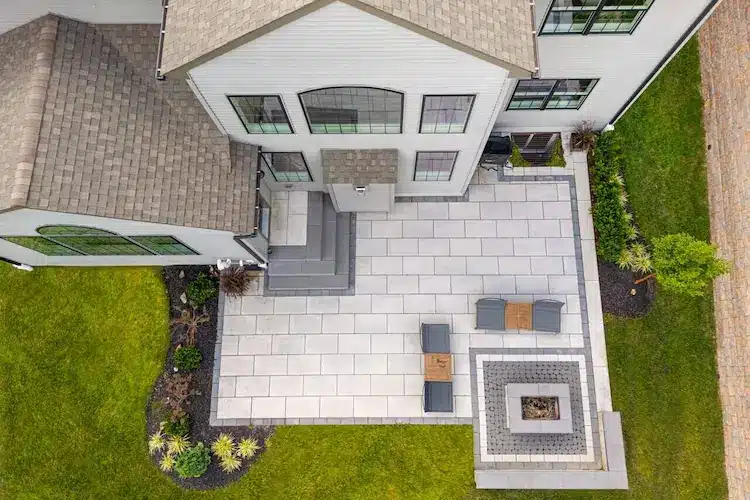 Techo Bloc paver patio with modern decorative border 6 Luxury paver patio with slip-resistant Techo-Bloc pavers.